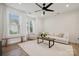 Living room features a neutral color palette, hardwood floors, and large windows at 330 Simeon Dr, Charlotte, NC 28208
