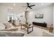 Open living room with kitchen views, hardwood floors, and neutral decor at 330 Simeon Dr, Charlotte, NC 28208