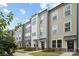 Row of three-story townhouses with gray siding at 330 Simeon Dr, Charlotte, NC 28208