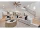 Spacious living room with a staircase, modern furniture, and open access to the kitchen and dining area at 3415 Waxhaw Indian Trail S Rd, Waxhaw, NC 28173