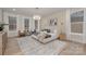 Bright main bedroom with ample natural light, a cozy sitting area, and elegant decor at 3415 Waxhaw Indian Trail S Rd, Waxhaw, NC 28173
