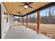 Covered patio with wood ceiling, fan, and view of the backyard at 3415 Waxhaw Indian Trail S Rd, Waxhaw, NC 28173