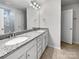 Bathroom features granite countertops, dual sinks, and a walk-in shower at 3922 Townes Blvd, Terrell, NC 28682