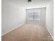 Spacious bedroom with neutral walls and carpet at 3922 Townes Blvd, Terrell, NC 28682