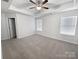 Bright and airy bedroom with carpeted floors and ceiling fan at 3922 Townes Blvd, Terrell, NC 28682