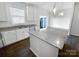 Modern kitchen featuring granite countertops, stainless steel appliances, and an island at 3922 Townes Blvd, Terrell, NC 28682