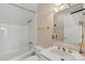 Clean bathroom showcasing a tile shower and tub, toilet, sink, mirror, and gold fixtures at 430 43Rd Nw Ave, Hickory, NC 28601