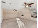 Large bedroom featuring multiple ceiling fans, windows, and built in window seats at 430 43Rd Nw Ave, Hickory, NC 28601