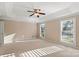 Spacious bedroom with ceiling fan and large windows at 430 43Rd Nw Ave, Hickory, NC 28601