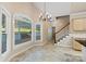This dining area offers a large window for natural light and a staircase to access the second floor at 430 43Rd Nw Ave, Hickory, NC 28601