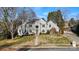 Two-story home with a manicured lawn and a long driveway at 430 43Rd Nw Ave, Hickory, NC 28601