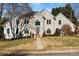 Two-story house with stucco exterior, landscaping, and walkway at 430 43Rd Nw Ave, Hickory, NC 28601