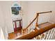 Entry foyer with hardwood floors, staircase, chandelier, and a red front door showcasing curb appeal at 430 43Rd Nw Ave, Hickory, NC 28601
