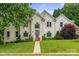 Beautiful two-story home features a well-manicured lawn, mature trees, and a grand entrance with meticulously maintained landscaping at 430 43Rd Nw Ave, Hickory, NC 28601