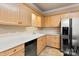 Kitchen features light wood cabinets, stainless steel appliances, and ample counter space at 430 43Rd Nw Ave, Hickory, NC 28601