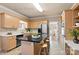 Bright kitchen features stainless steel appliances, a tile floor, and a large island with stool seating at 430 43Rd Nw Ave, Hickory, NC 28601