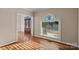 Bright living room with hardwood floors and a large arched window at 430 43Rd Nw Ave, Hickory, NC 28601