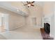 Living room with vaulted ceiling, fireplace, and carpet at 430 43Rd Nw Ave, Hickory, NC 28601