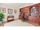 Well-appointed home office featuring custom built-in shelves and cabinetry, creating an organized and functional workspace at 430 43Rd Nw Ave, Hickory, NC 28601