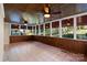 Inviting sunroom featuring wood paneling, tile floors, and large windows with natural light at 430 43Rd Nw Ave, Hickory, NC 28601