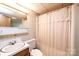 Basement bathroom with shower and updated vanity at 4745 16Th Street Ne Dr, Hickory, NC 28601