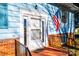 Front entrance with white door, brick base, and American flag at 4745 16Th Street Ne Dr, Hickory, NC 28601