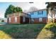 Brick and blue board and batten house with a deck at 4745 16Th Street Ne Dr, Hickory, NC 28601