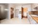 Kitchen with white cabinets, wood laminate countertops, and access to dining room at 4745 16Th Street Ne Dr, Hickory, NC 28601