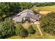 Expansive barn with living quarters, garage, and additional workspace for the equestrian enthusiast at 795 French Belk Rd, Mt Ulla, NC 28125