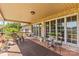 Inviting covered porch with comfortable seating, perfect for relaxation at 795 French Belk Rd, Mt Ulla, NC 28125