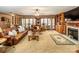 Inviting living room with a fireplace, custom built-ins, and plush seating at 795 French Belk Rd, Mt Ulla, NC 28125