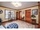 Office with hardwood floors, warm lighting and built-in shelving at 795 French Belk Rd, Mt Ulla, NC 28125