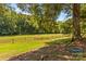 Picturesque paddock with lush green grass and wooden fence, creating a peaceful environment for horses at 795 French Belk Rd, Mt Ulla, NC 28125