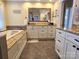 Bathroom with double vanity, bathtub and tile floors at 990 19Th Nw Ave, Hickory, NC 28601