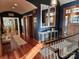 Spacious foyer featuring hardwood floors, elegant console table, and a grand staircase leading to the upper level at 990 19Th Nw Ave, Hickory, NC 28601