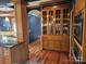 Kitchen with custom cabinetry and hardwood floors leading to other rooms at 990 19Th Nw Ave, Hickory, NC 28601