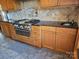 Updated kitchen with stainless steel gas range, granite counters, and tile backsplash at 990 19Th Nw Ave, Hickory, NC 28601
