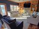 Living room with lake views and a stone fireplace at 990 19Th Nw Ave, Hickory, NC 28601