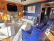 Living room with a stone fireplace and hardwood floors at 990 19Th Nw Ave, Hickory, NC 28601