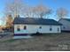 Simple backyard with a small patio and spacious lawn at 1014 N Main St, China Grove, NC 28023