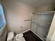 Clean bathroom with a sliding glass shower door and granite vanity at 1014 N Main St, China Grove, NC 28023