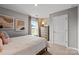 Bedroom with a queen-size bed, dresser, and gray walls at 1024 20Th Avenue Se Way, Hickory, NC 28602