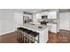 Modern kitchen with white cabinets, granite countertops, and stainless steel appliances at 1024 20Th Avenue Se Way, Hickory, NC 28602