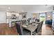 Modern kitchen with an island, stainless steel appliances, and granite countertops at 1024 20Th Avenue Se Way, Hickory, NC 28602
