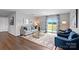 Bright living room with hardwood floors, comfy seating, and sliding glass doors leading to a patio at 1024 20Th Avenue Se Way, Hickory, NC 28602