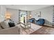 Spacious living room featuring hardwood floors, a neutral color palette, and ample natural light at 1024 20Th Avenue Se Way, Hickory, NC 28602