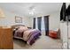 Bedroom with a queen bed and rocking chair at 112 Artisan Ct, Mooresville, NC 28117
