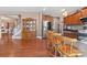 Kitchen with island, seating, stainless steel appliances, and wood cabinets at 112 Artisan Ct, Mooresville, NC 28117