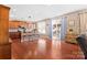 Spacious kitchen with island, hardwood floors, stainless steel appliances, and ample cabinet space at 112 Artisan Ct, Mooresville, NC 28117