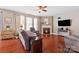 Relaxing living room featuring fireplace and hardwood floors at 112 Artisan Ct, Mooresville, NC 28117